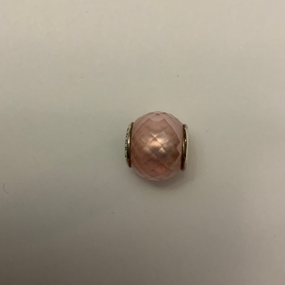 Pandora Pink Faceted petite charm with facets.